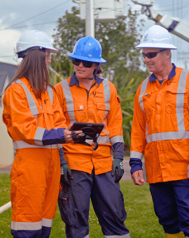 Speaker engaging with an audience during a presentation, fostering learning and collaboration in a professional setting.