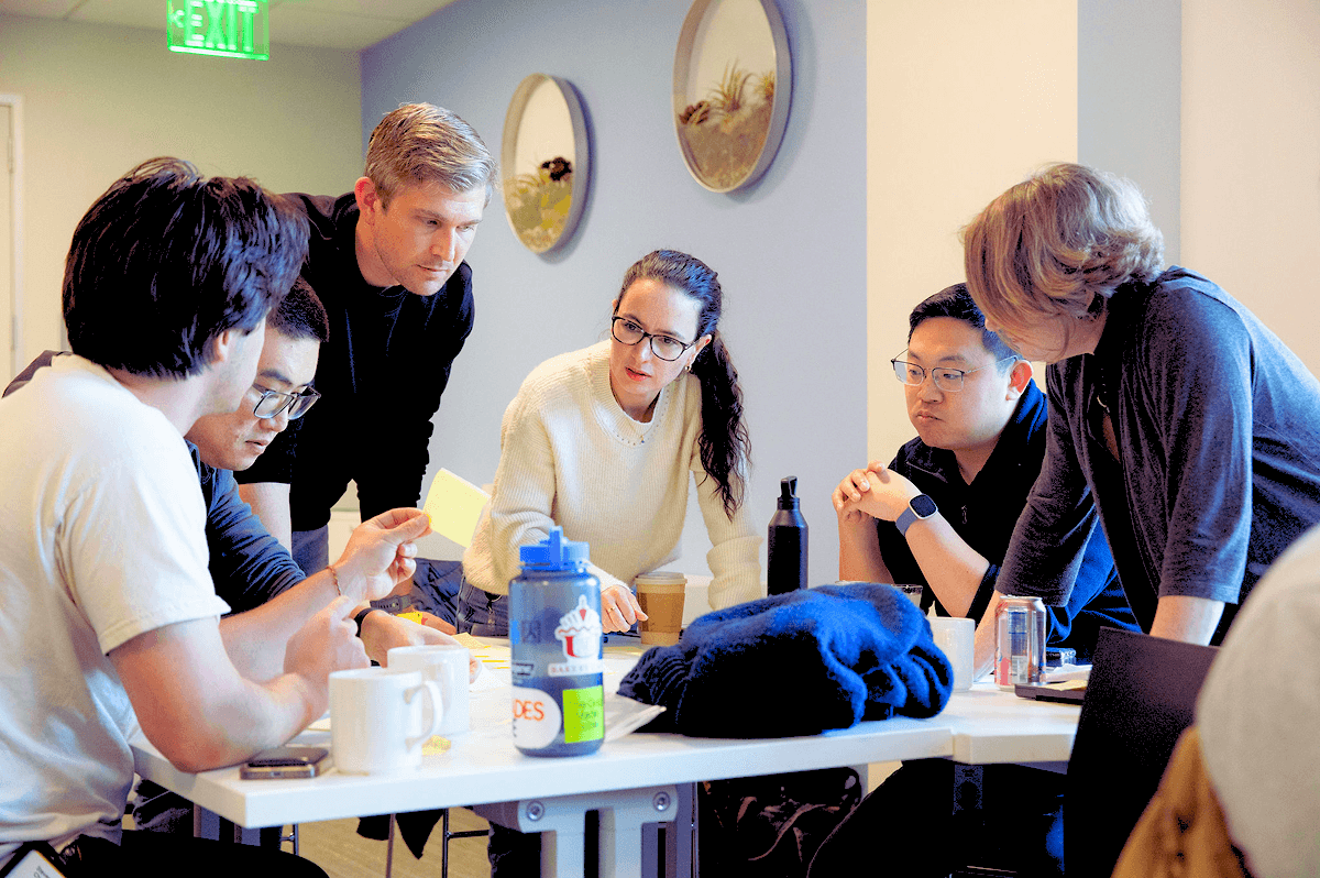 Focused engineer working on a precision electronics project under a microscope, highlighting innovation and technical expertise.